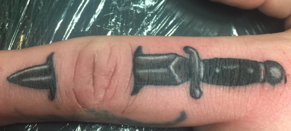 dagger tattoo, finger tattoo, Johnny calico, knife tattoo, traditional tattoo